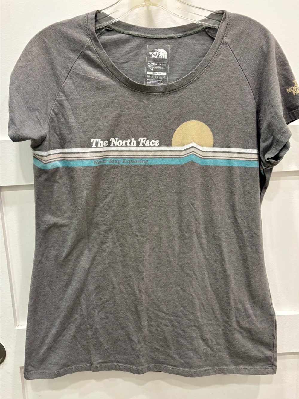 The North Face Gray Cap Sleeve Slim Fit Tee with Sunrise Stripe